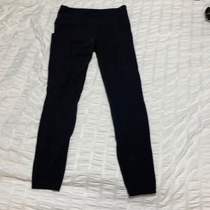 Athleta 7/8 length leggings with stash pockets. XS - great condition.